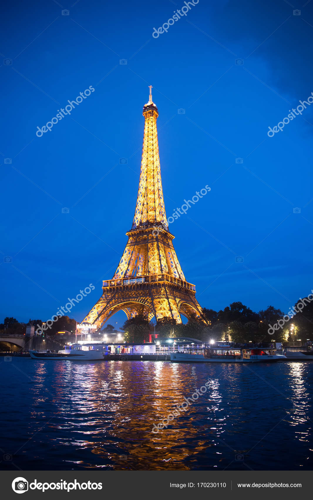 Eiffel Tower at sunset in Paris, France. Romantic travel background. –  Stock Editorial Photo © stetsik #170230110