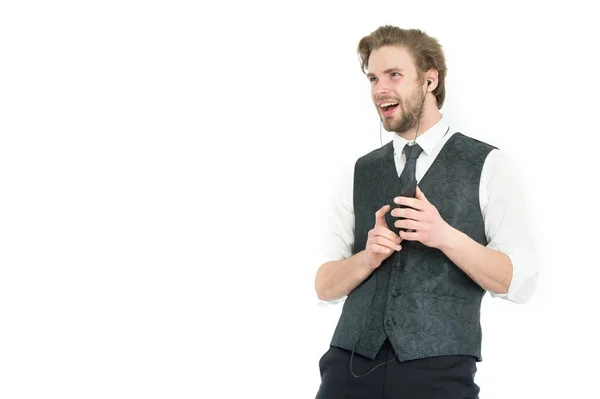 Hombre de negocios en auriculares con teléfono celular . —  Fotos de Stock