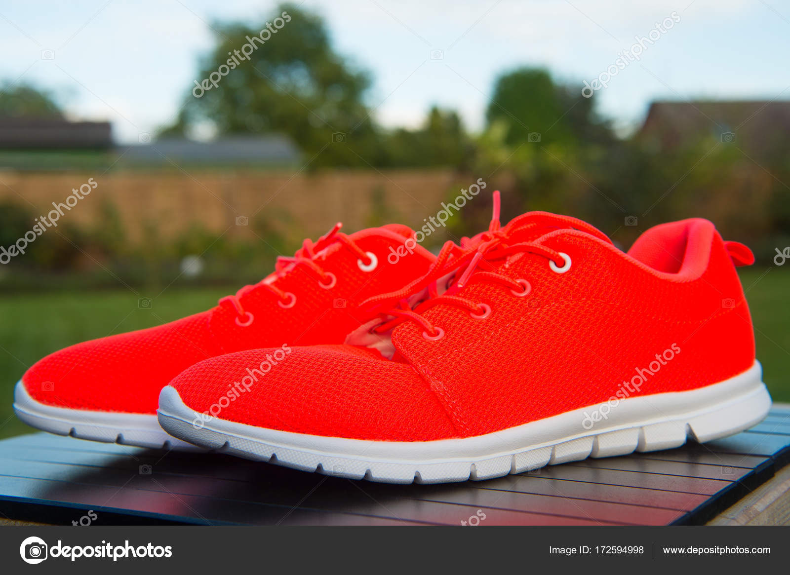 bright orange running shoes