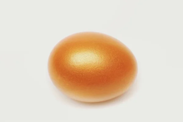 Traditional egg painted in golden color — Stock Photo, Image