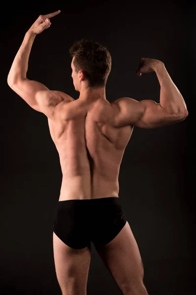 Hombre atleta con cuerpo muscular, torso, vista trasera —  Fotos de Stock