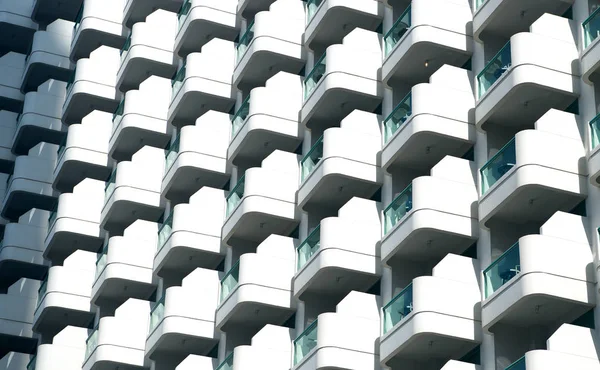 Glass balconies on modern building facade, architecture background — Stock Photo, Image