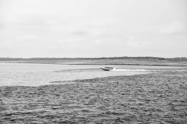 water meeting in brazil -amazon river with rio del negro