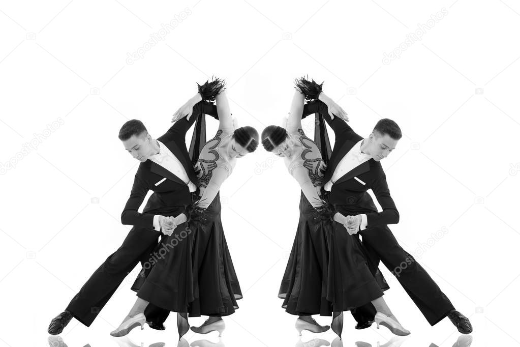 ballroom dance couple in a dance pose isolated on white