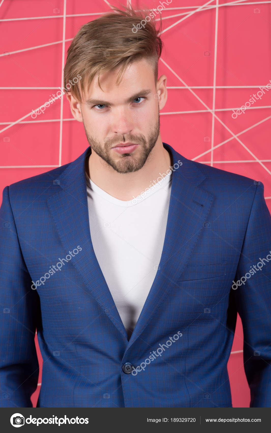 Man in formal suit jacket and tshirt, fashion. Businessman