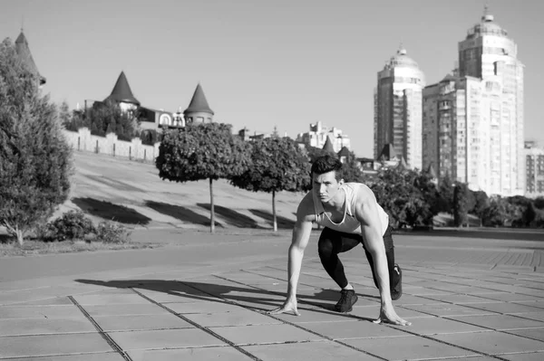 Athlete on asphalt path on sunny summer day outdoors — Stock Photo, Image