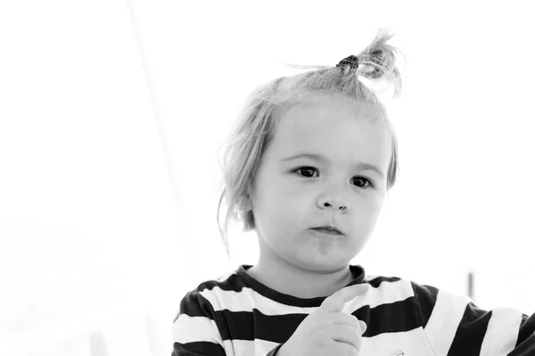 Boy child with blond hair ponytail in sailor shirt — Stock Photo, Image