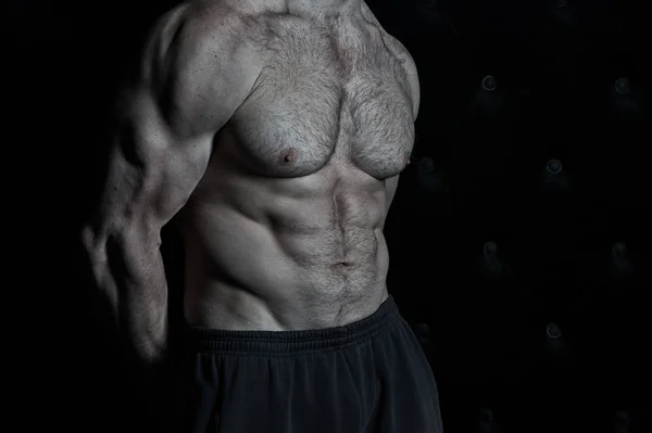 Torso muscular de fuerte modelo de fitness atlético. Torso mostrando seis abdominales, vintage —  Fotos de Stock