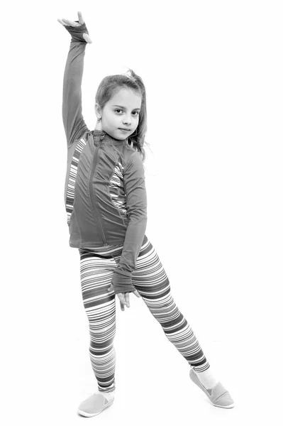 Exercício de menina pequena isolada no fundo branco . — Fotografia de Stock