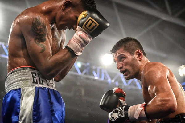 An unidentified boxers in the ring during fight for ranking points — Stock Photo, Image