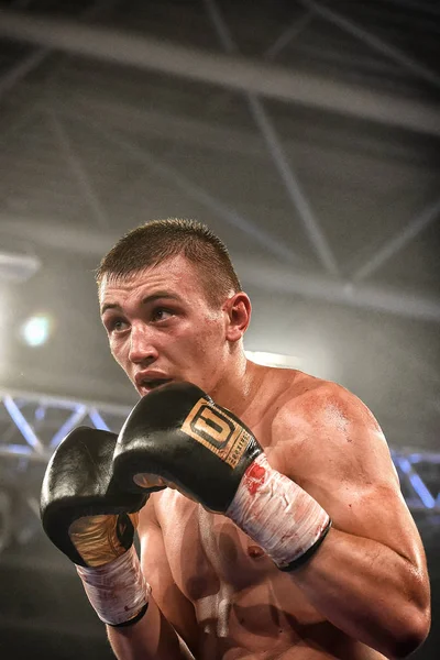 An unidentified boxers in the ring during fight for ranking points — Stock Photo, Image