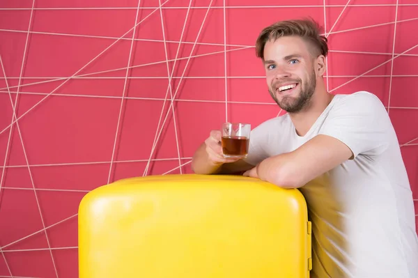 Positive delighted man standing in kitchen with coffee cup — Stock Photo, Image