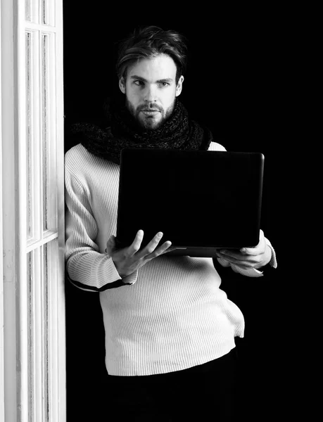 handsome bearded guy with laptop