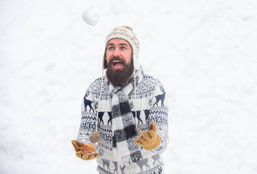 It is so cold. winter holiday. Morning before xmas. winter season. Christmas snow activity. bearded man in warm clothes. Happy new year. man having fun outdoor. happy hipster play snowballs