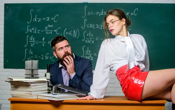 Maximise your learning experience. Bearded man learning with sexy teacher. Surprised student look at sensual woman. Private learning. Learning never ends — Stock Photo, Image