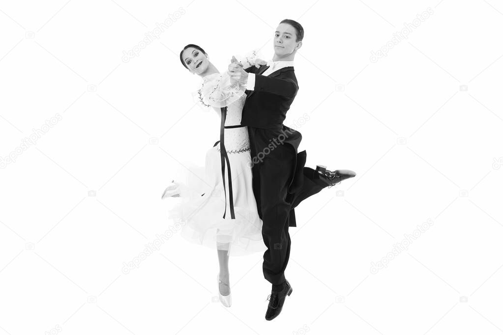 ballroom dance couple in a dance pose isolated on white background. ballroom sensual proffessional dancers dancing walz, tango, slowfox and quickstep just dance