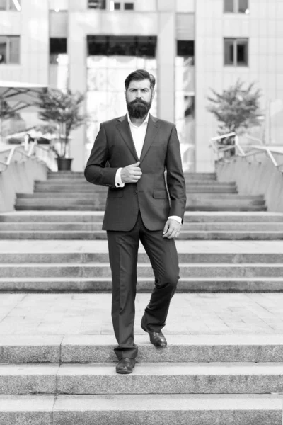 Conquer business world. Office worker confidently step on stairs. Bearded man going to work. Business man in modern city. Beginning of working day. Motivated for success. Toward business achievements — Stock Photo, Image