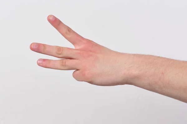 Count down and numbers concept. Male hand shows three fingers. — Stock Photo, Image