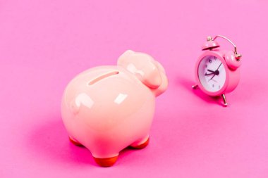 It is time to pay. Piggy bank pink pig and little alarm clock. Financial crisis. Economics and finance. Banking account. Bankruptcy and debt. Pay for debt. Bank collector service. Credit debt clipart