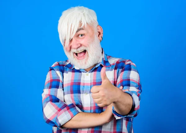 Mature hipster unusual appearance. Subculture and lifestyle. Barbershop and hairstylist. Expressing himself hairstyle. Subculture attributes. Emo subculture. Senior man with long bangs and beard — Stock Photo, Image