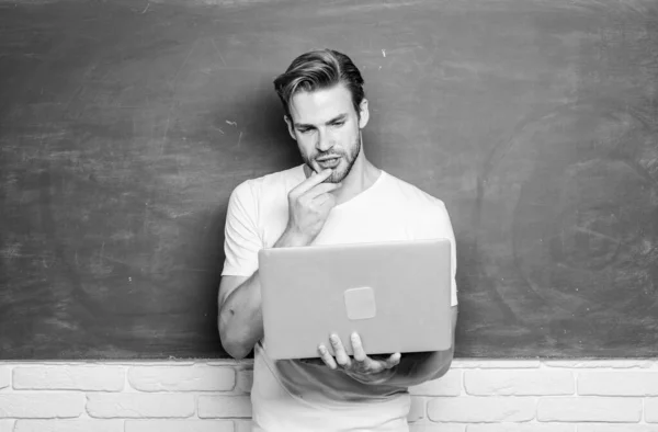 Handsome man use modern technology. Digital technology. Apply online course for programmers. Programming web development. Student learn programming language. School teacher programming with laptop — Stock Photo, Image