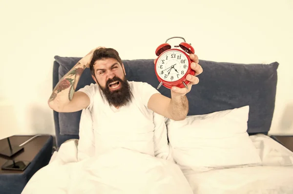 Best alarm clocks for people who hate mornings. Man bearded hipster hate wake up early. Destructive energy. Hardest moment of day. It is totally normal to hate your alarm sound. Hateful schedule