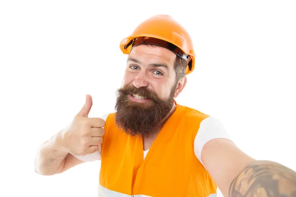 Master committed to superior quality and results. Master builder give thumbs up hand. Bearded man master happy smiling isolated on white. Worker in protective helmet and safety vest. Master of craft — Stock Photo, Image