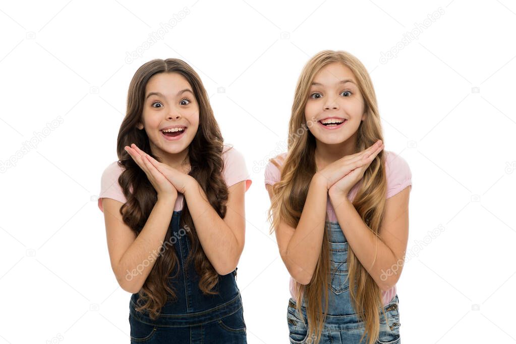 Such a surprise. Sincere excitement. Kids girls long healthy shiny hair wear casual clothes. Little girls excited happy faces. Kids happy cute faces feel excited. Exciting moments. Excitement emotion