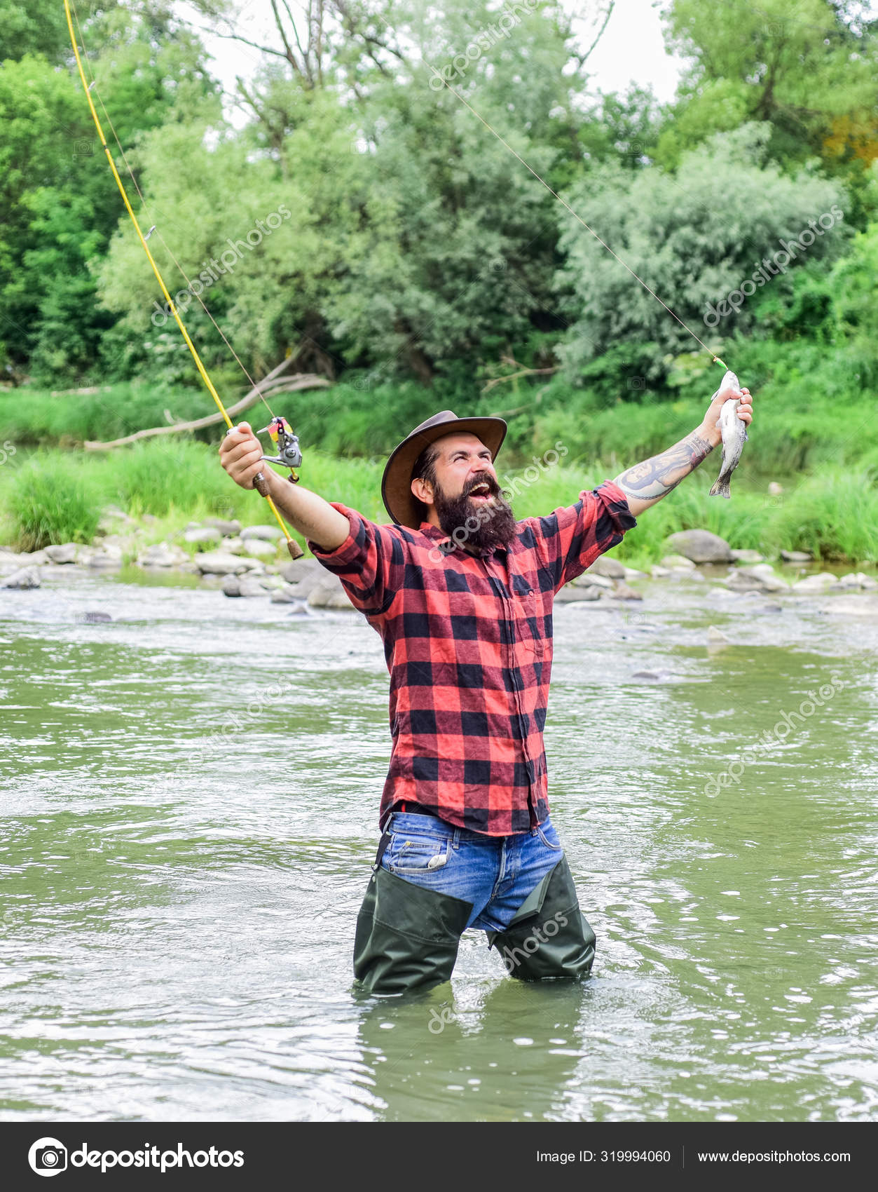 Male hobby. hobby and sport activity. fisherman show fishing technique use  rod. summer weekend. Happy fly fishing. bearded fisher in water. mature man  fly fishing. man catching fish — Stock Photo ©