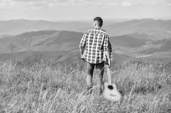Play What you Want. western camping and hiking. happy and free. cowboy man with muscular torso. acoustic guitar player. country music song. sexy man with guitar in checkered shirt. hipster fashion — 스톡 사진