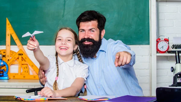 School learners leisure. Creating a community of learners. Teacher and schoolgirl. Man bearded pedagogue and pupil having fun. Developing caring learners who are actively growing and achieving — Stock Photo, Image