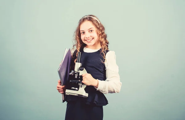 Science research in lab. Small genius girl with microscope. education and knowledge. back to school. small girl scientist testing. child study bilogy lesson. Discover future. Confident graduate — Stock Photo, Image