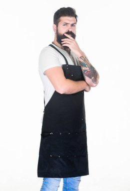 Ciddi sakallı aşçı. Restoran personeli. Hippi profesyonel barista önlüğü. Fast food restoranı. Garson ya da barmen. Servis içkisi hazır. Sakallı hippi önlük giyer. İnsan vahşi hipster pişirir.