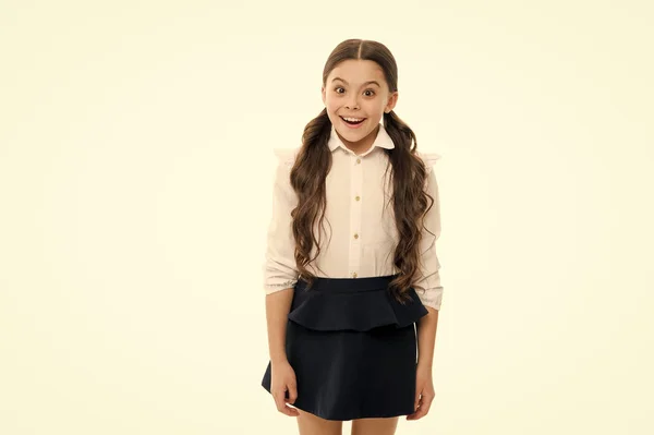 Perfect schoolgirl. Happy girl wear school uniform. Gorgeous tails perfect for every day of week. Back to school concept. Schoolgirl happy smiling pupil long curly hair. Diligent schoolgirl — Stock Photo, Image