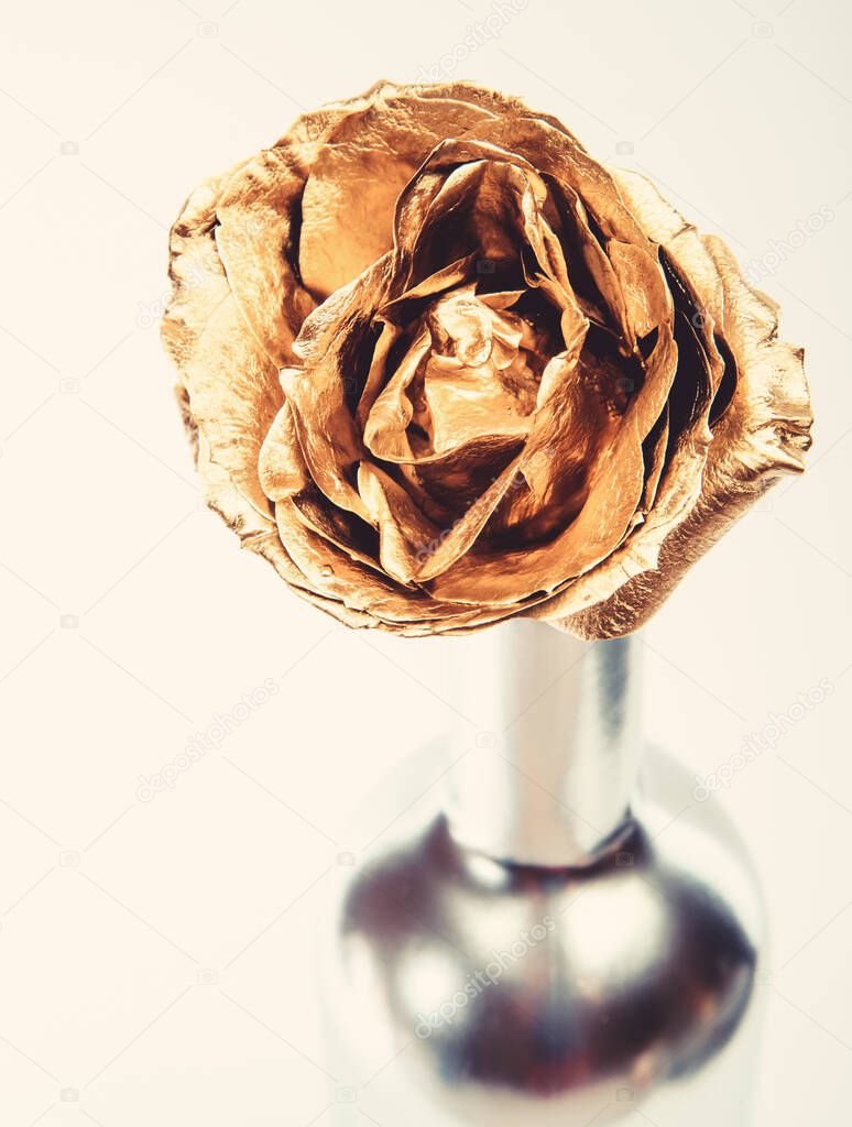 floristics business. Vintage and jewelry. luxury and success. metallized decoration. antique concept. golden flower. flower shop decor. natural beauty. Gold rose. wealth and richness. finance concept