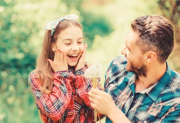 Seasonal allergies concept. Outgrow allergies. Happy family vacation. Father and little girl enjoy summertime. Dad and daughter collecting dandelion flowers. Keep allergies from ruining your life — Stock Photo, Image