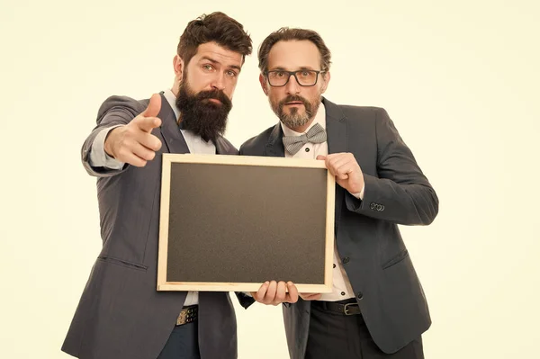 announcement. party invitation. partners celebrate start up business on white. businessmen use phone, copy space. bearded men hold advertisement blackboard. welcome on board. invitation concept