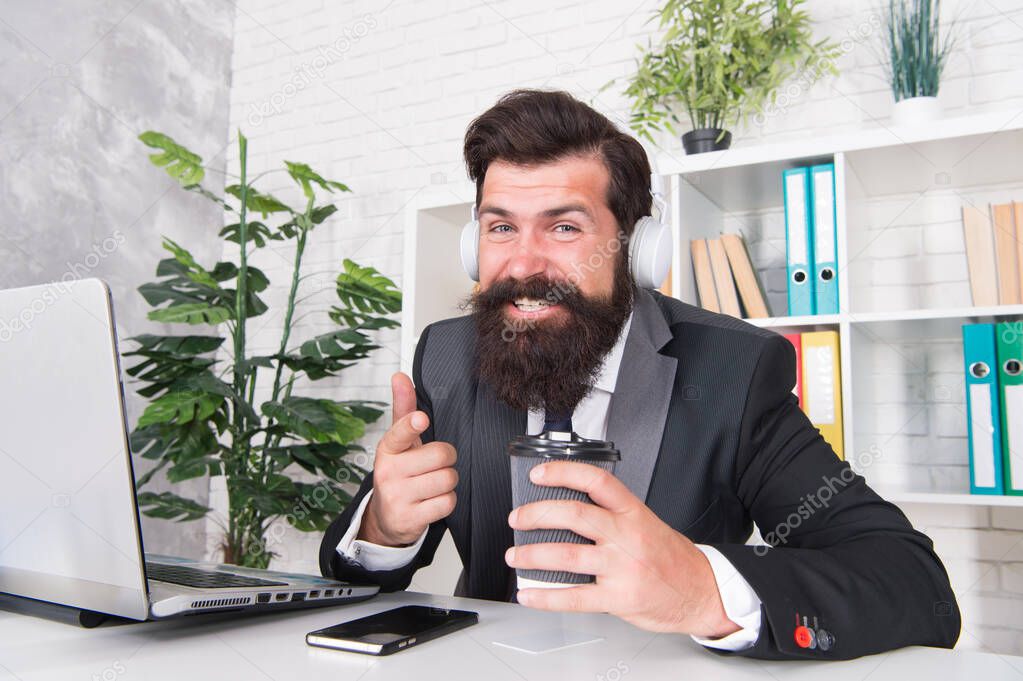 Encrypted communication app will protect your company secrets. Bearded man use wireless communication in office. Businessman establish online communication with customers. Business communication