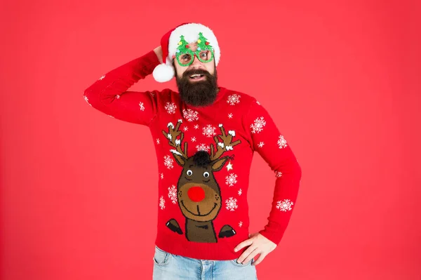 Buy festive clothing. Holidays accessories. Hipster bearded man wear winter sweater and hat. Knitted sweater. Happy new year. Christmas spirit. Winter party outfit. Sweater with deer. Clothes shop — Stock Photo, Image