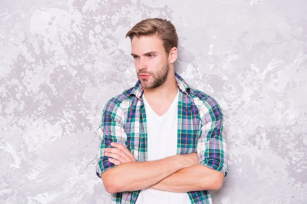 good man hard to find. mens sensuality. sexy guy casual style. macho man grunge wall. male fashion summer trend. confident student checkered shirt. unshaven man care beard. barbershop concept