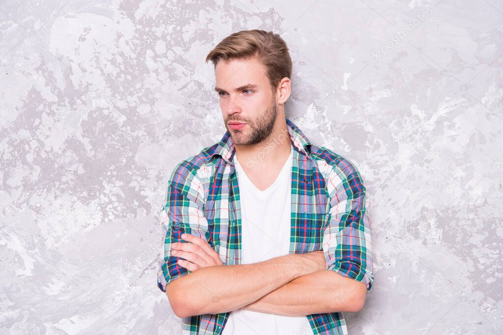 good man hard to find. mens sensuality. sexy guy casual style. macho man grunge wall. male fashion summer trend. confident student checkered shirt. unshaven man care beard. barbershop concept