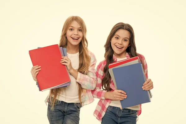 Language courses for youth. Girls with school textbooks white background. School concept. We love study. Pupils carrying textbooks to school classes. Studying is fun. Buy book for extra school course — Stock Photo, Image