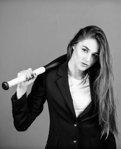 Aggressive business. Business lady boss. Time demands decisive actions. Confidence and strength. Life game. Build career. Woman pretty girl bear formal jacket and hold baseball bat. Business strategy