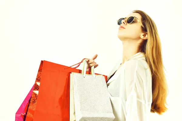 Fashionable sexy woman or girl holding package or bags — Stock Photo, Image