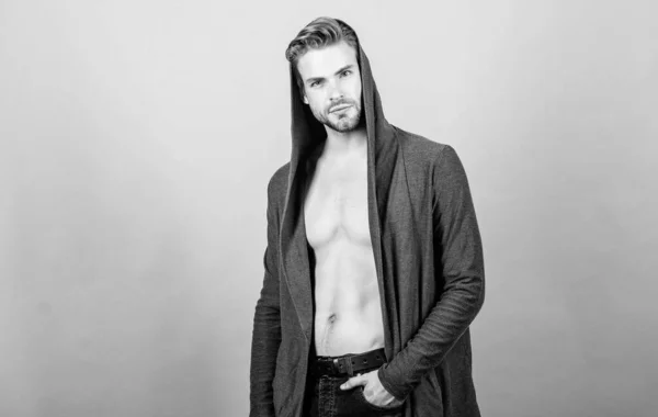 Masculinity and confidence. Man well groomed handsome hooded clothes. Unconventional but masculine look. Brute masculinity extremely commanding looking conventionally handsome. Masculinity concept — Stock Photo, Image