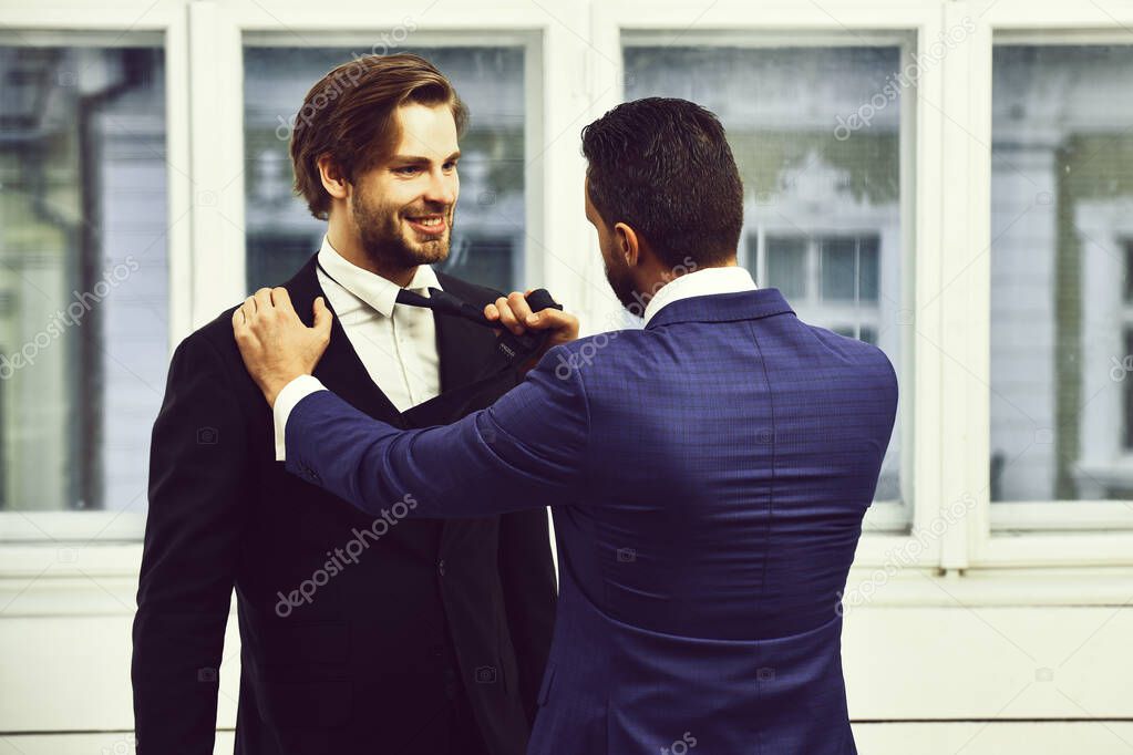 business conflict, confident men or businessmen fight with tie