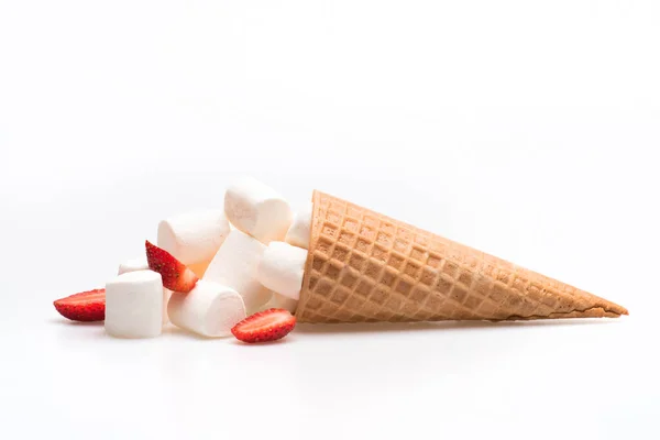 Ice cream cone with marshmallow and strawberry on white background — Stock Photo, Image