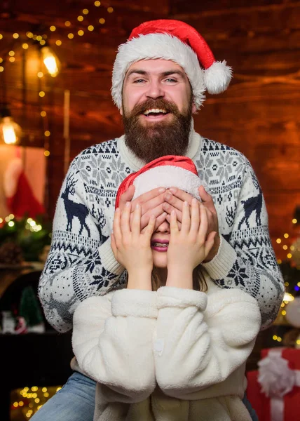 Guess who. Festive spirit. Lovely married couple cuddle christmas tree background. Cheerful mood. Christmas is time for giving. Couple in love enjoy christmas holiday celebration. Happy new year