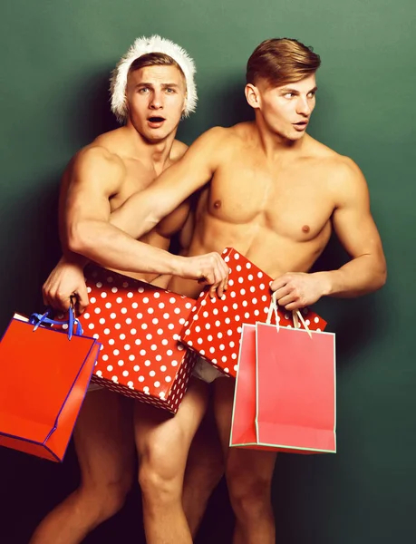 Hezký macho santa dvojčata — Stock fotografie