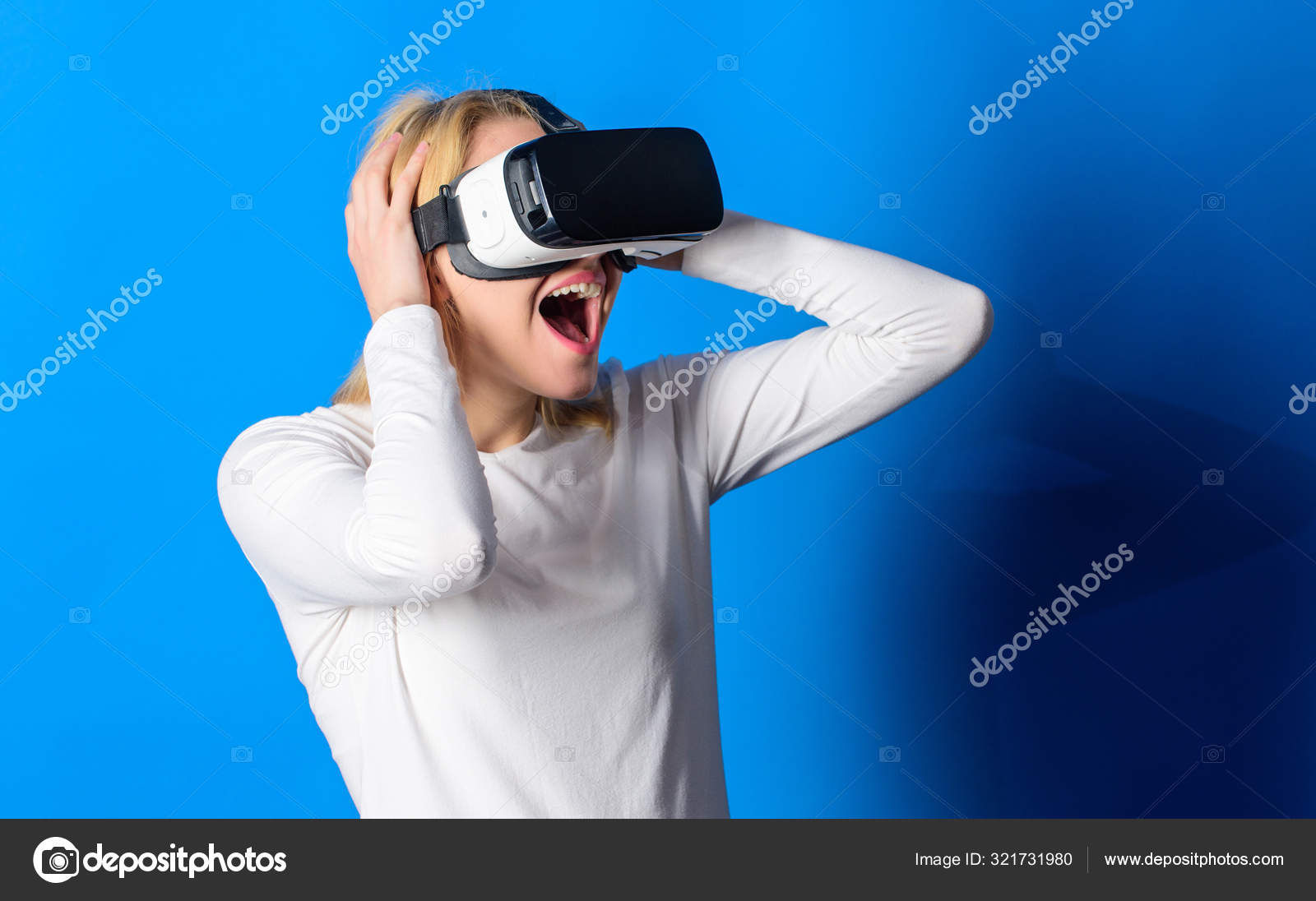 Funny woman experiencing 3D gadget technology - close up. Woman enjoying cyber fun experience in vr. Woman using VR device. VR concept. Stock Photo by ยฉstetsik 321731980 Funny woman experiencing 3D gadget technology - close up. Woman enjoying cyber fun experience in vr. Woman using VR device. VR concept. Stock Photo by ยฉstetsik 321731980